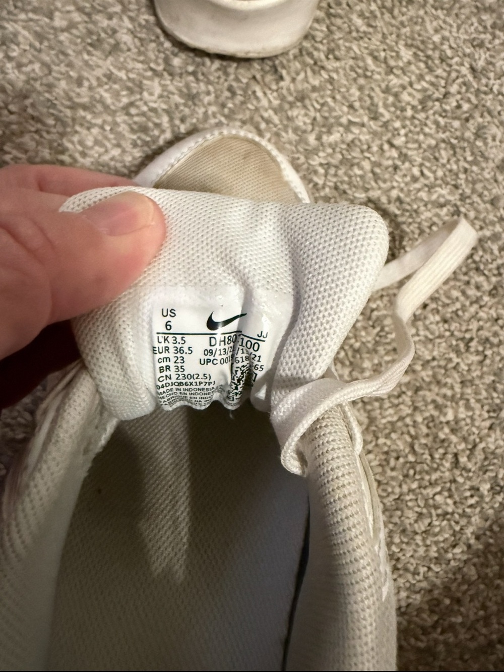 Women’s Nike White Mesh Sneakers with Subtle Cream Accents